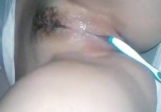 beautiful pussy masturbating using tooth brush and Cums - 2 min