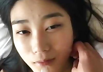 Cute little Asian girl gets a facial after bj