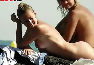 Hidden beach camera clip of blond and brunette nudist girls
