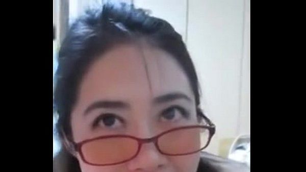 Geeky Asian girlfriend sucks a big dick and gets a facial